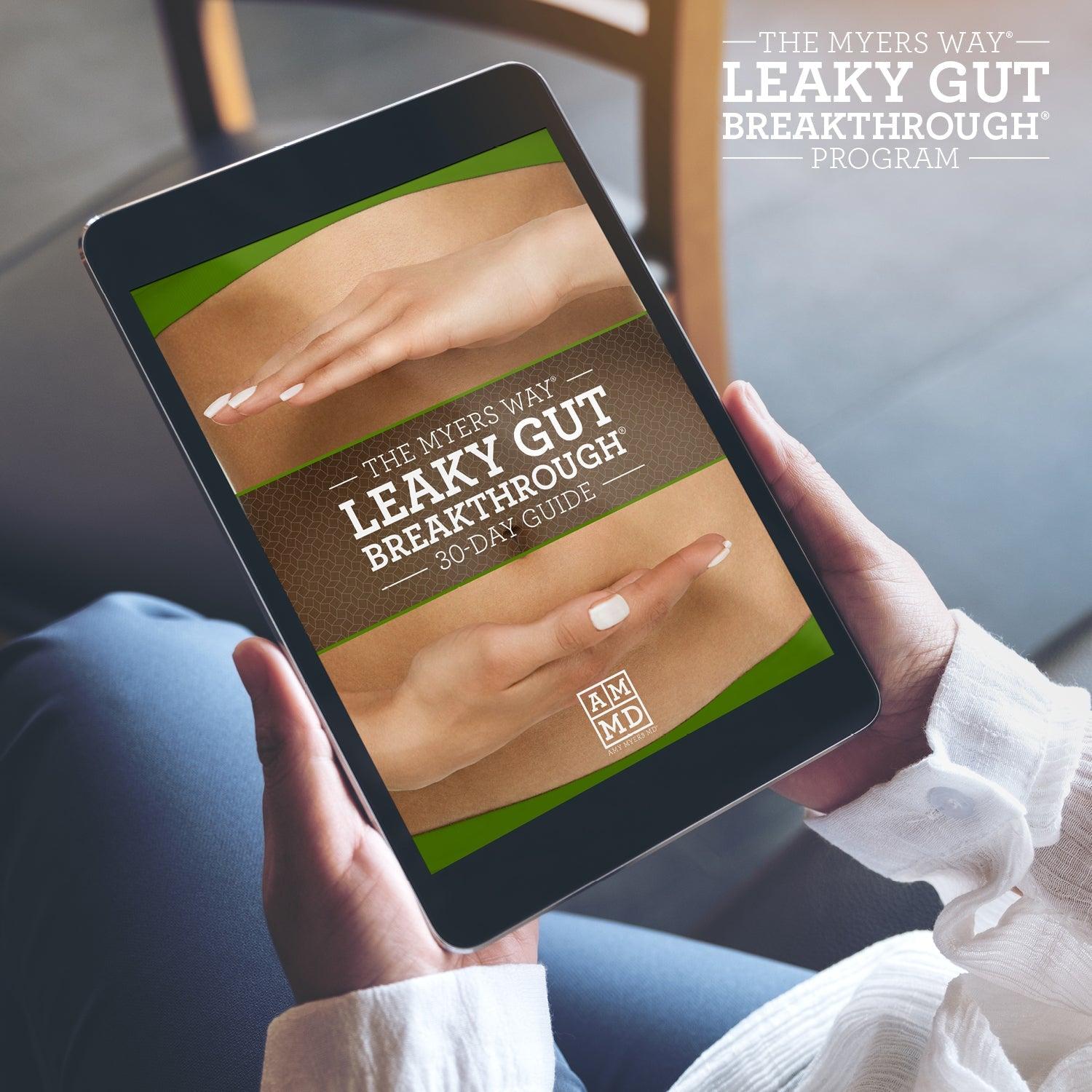 A Woman views The Leaky Gut Breakthrough Program 30-day Guide on a tablet - Amy Myers MD®