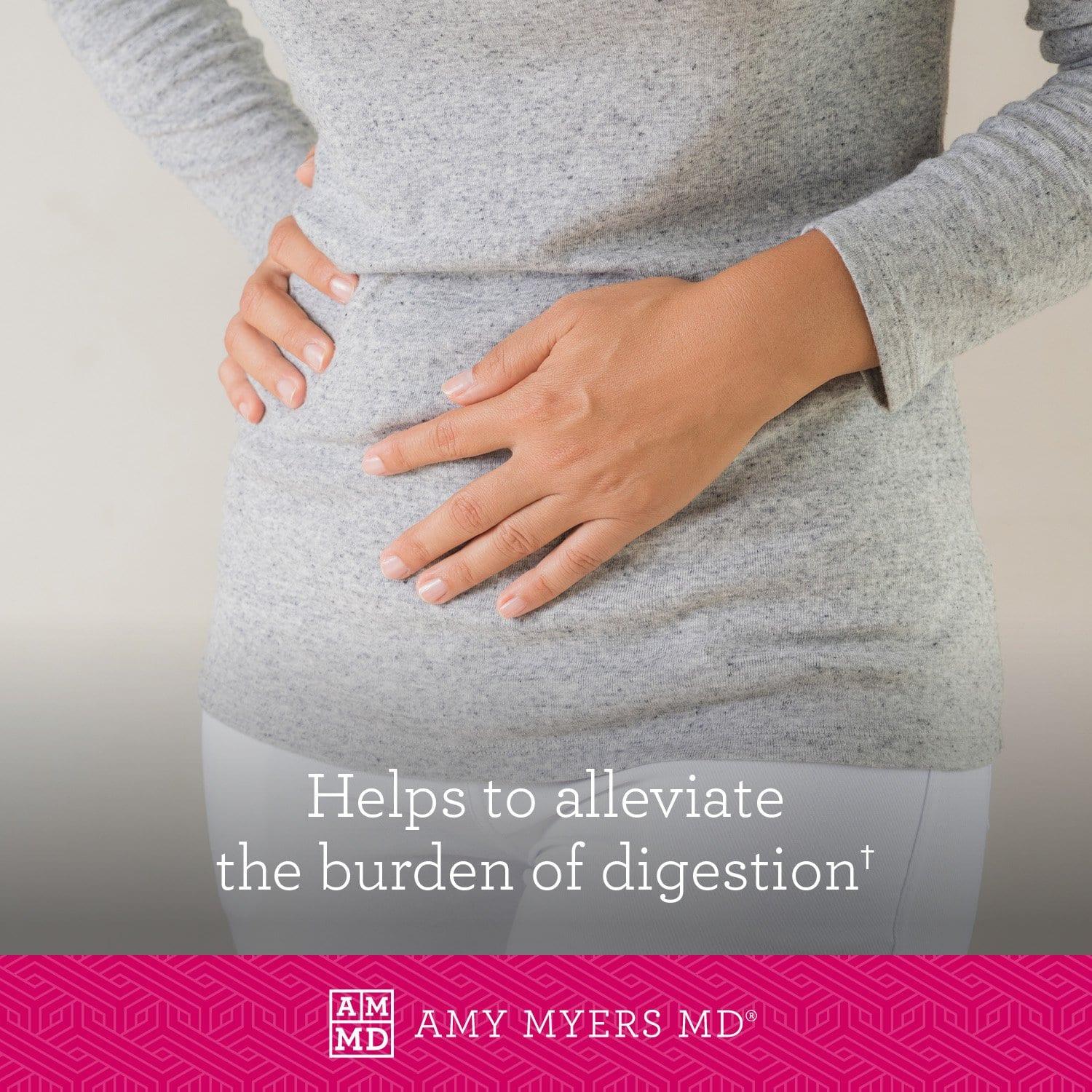 A woman feeling digestive pain - Complete Enzymes aid digestion - Amy Myers MD®