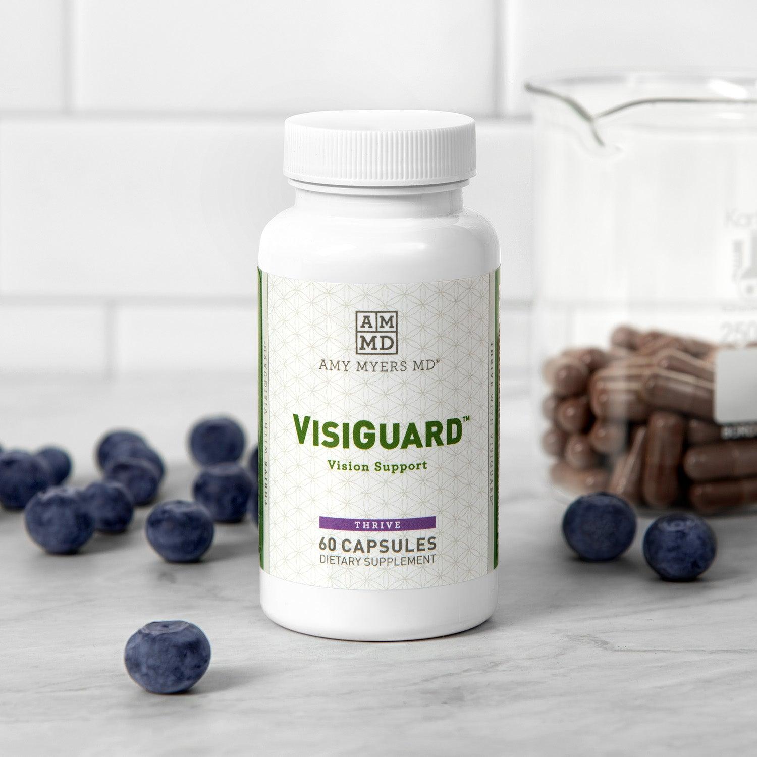 A Bottle of Visiguard™ Vision Support Supplement on a countertop - Amy Myers MD®
