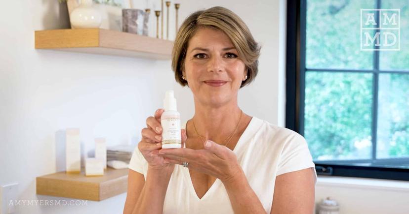 Dr. Myers holding up skincare bottle - My Favorite Non-Toxic Beauty Brand - Amy Myers MD”