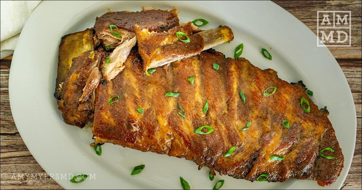A plate of slow-roasted BBQ ribs made from Amy Myers Gut Recovery recipe eBook