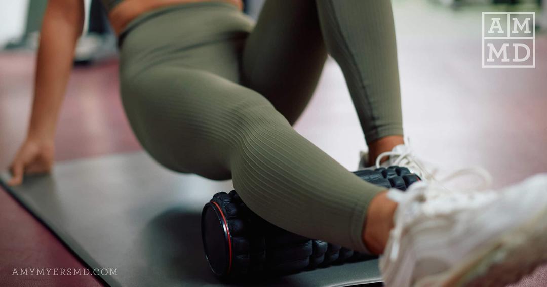 Person Using Yoga Foam Roller - Does L-Glutamine Support Muscle Recovery? - Amy Myers MD®