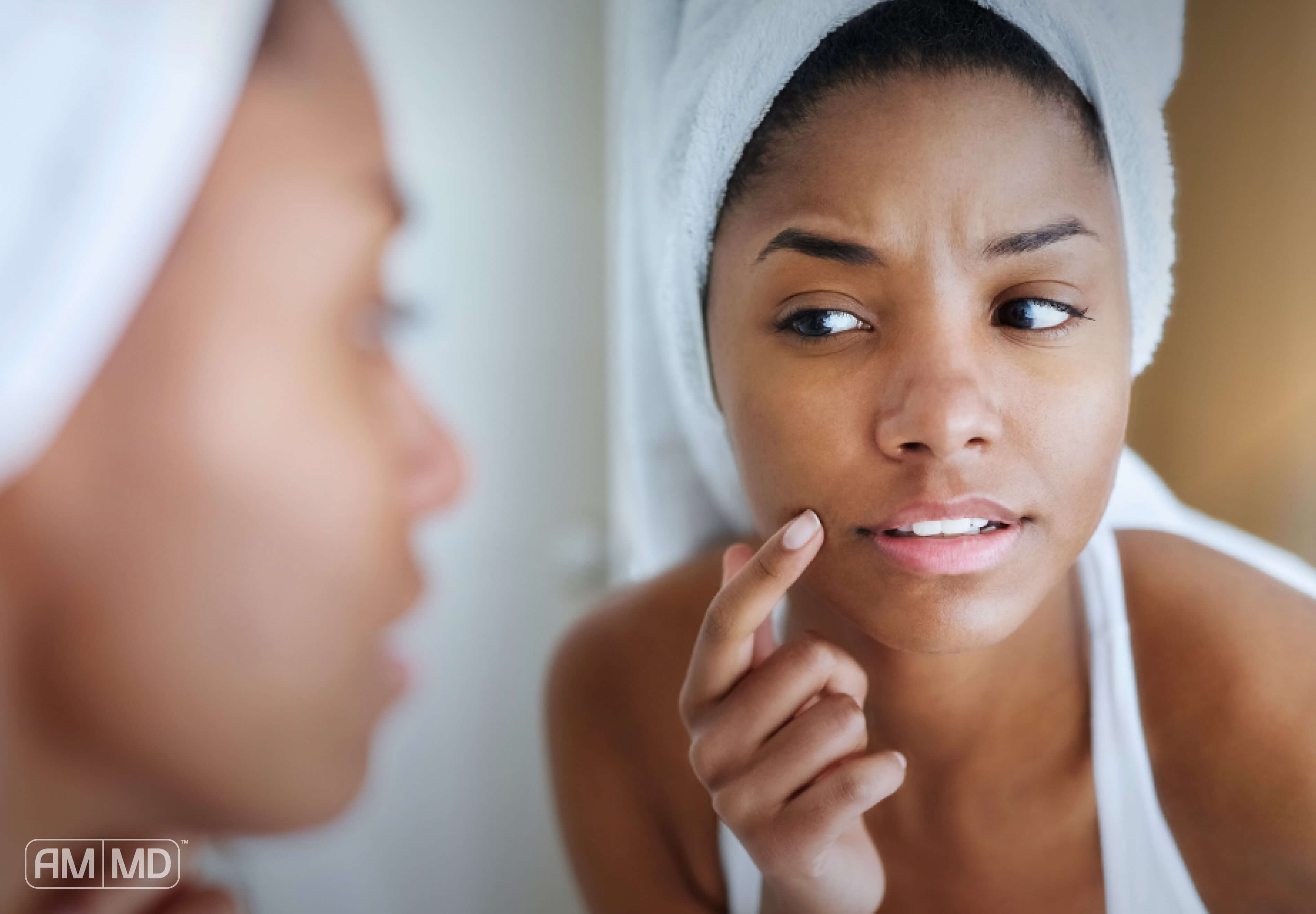 Girl looking at face in mirror - Gut Health and Hormones - Amy Myers MD®