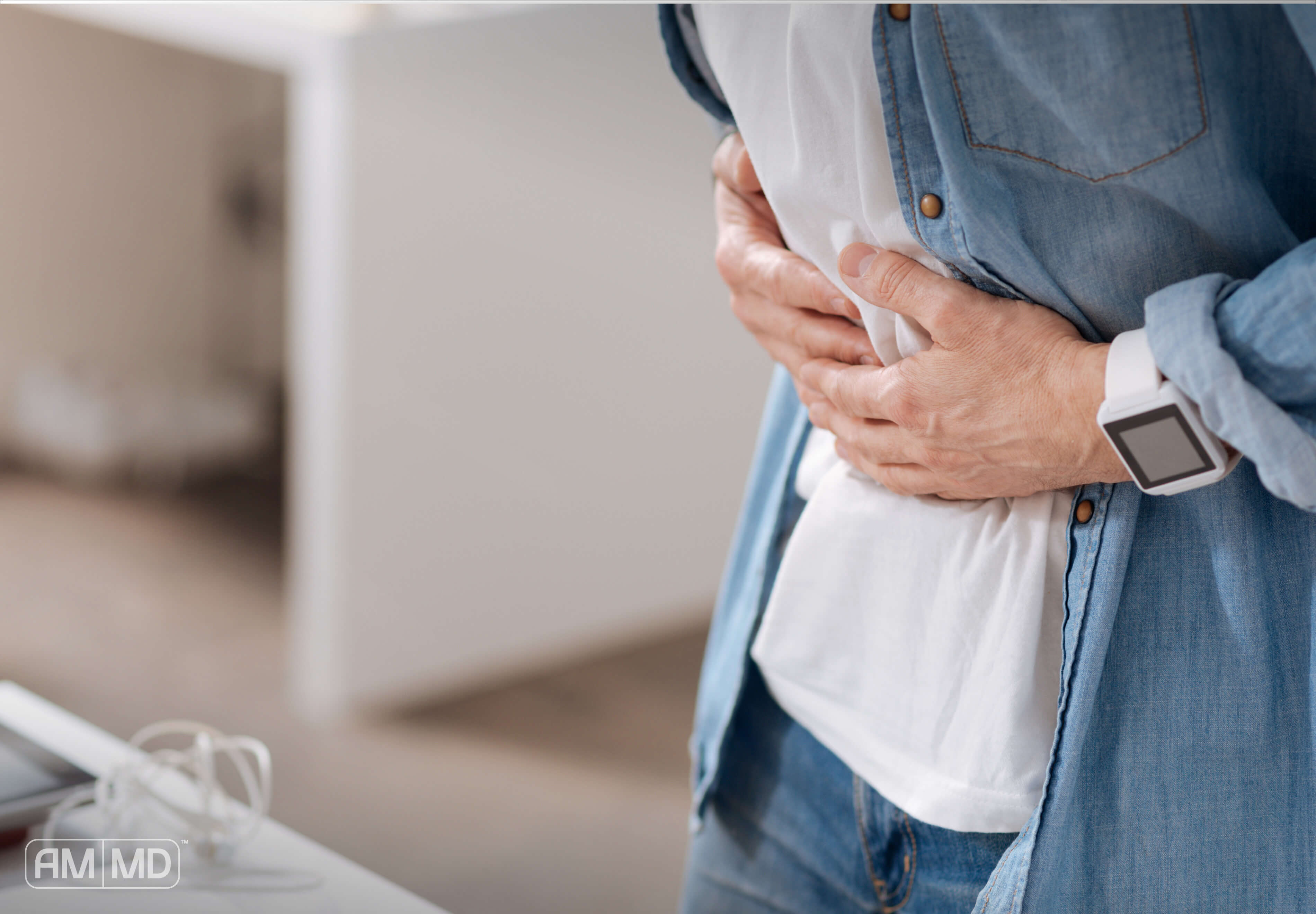 Holding stomach - How Do I Know If I Have Sibo vs Candida? - Amy Myers MD®