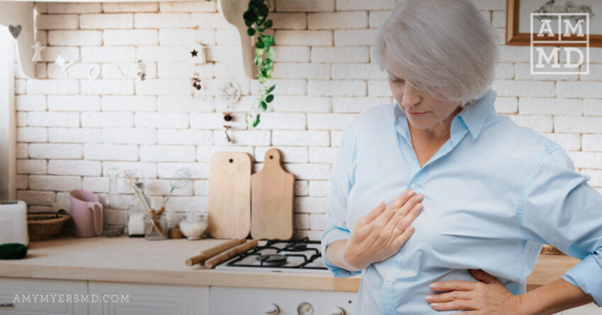 Woman in her 60s experiencing heartburn - AMMD™