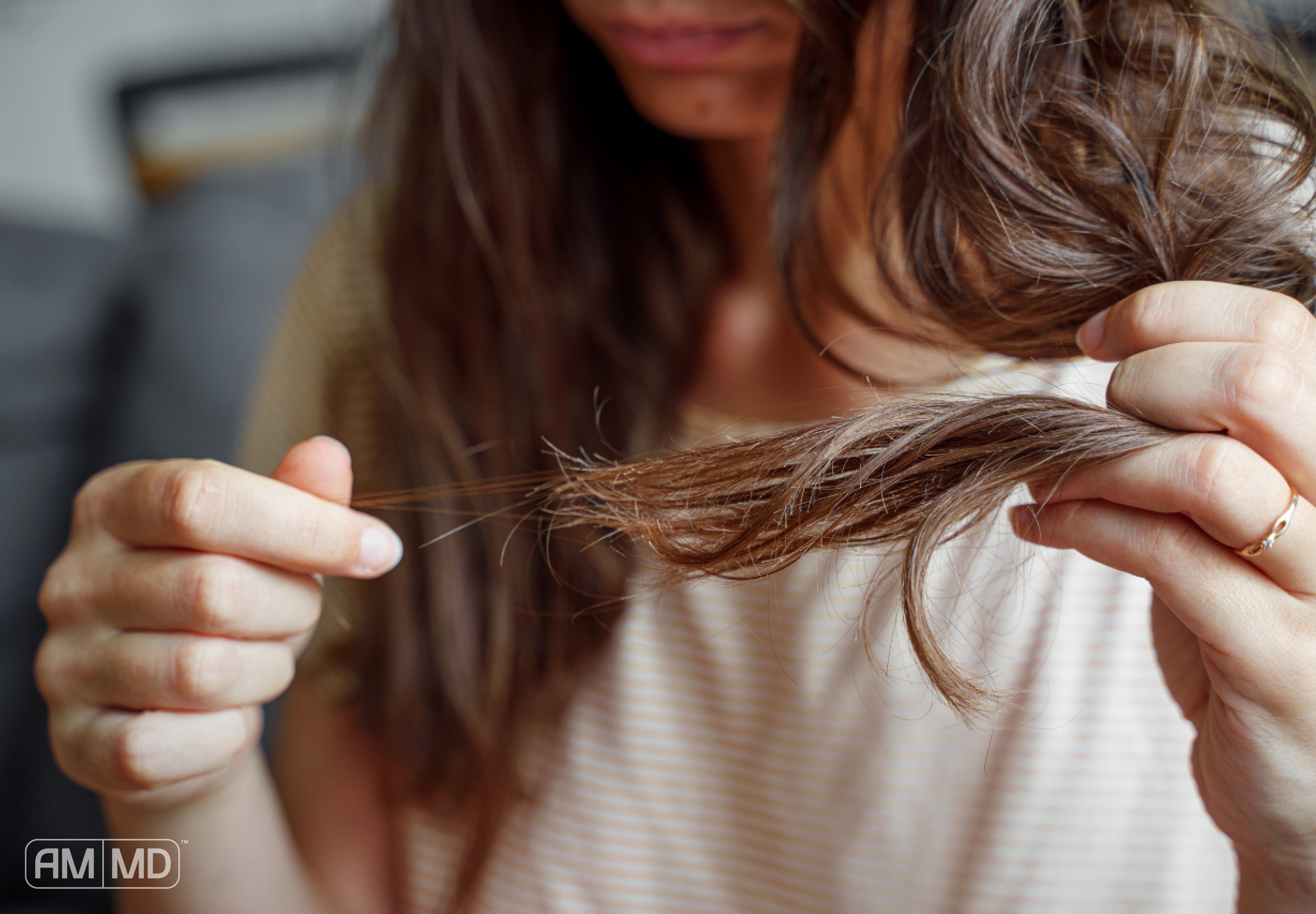 Woman hair shedding - 10 Signs of Perimenopause - AMMD™