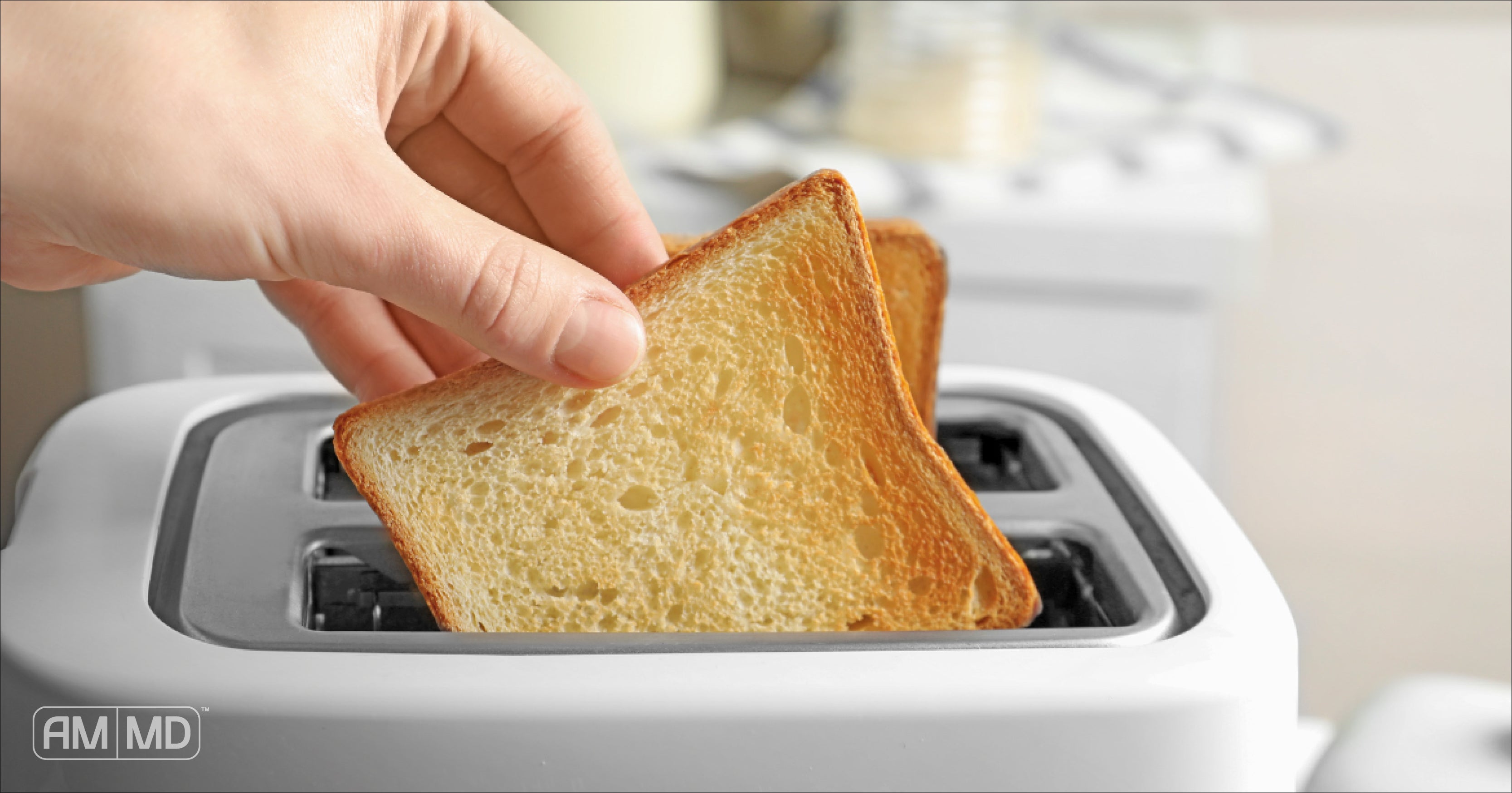Putting bread in the toaster - Gluten Detox: How to Recover From Exposure - AMMD™