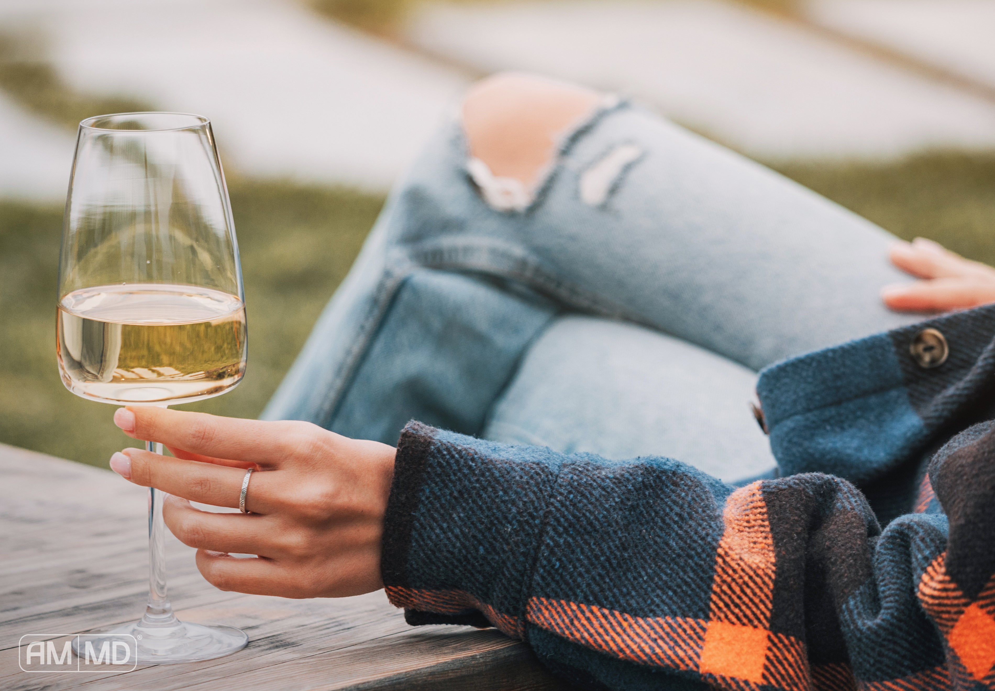 Glass of wine - How Does Alcohol Affect Your Immune System and Overall Wellness? - AMMD™