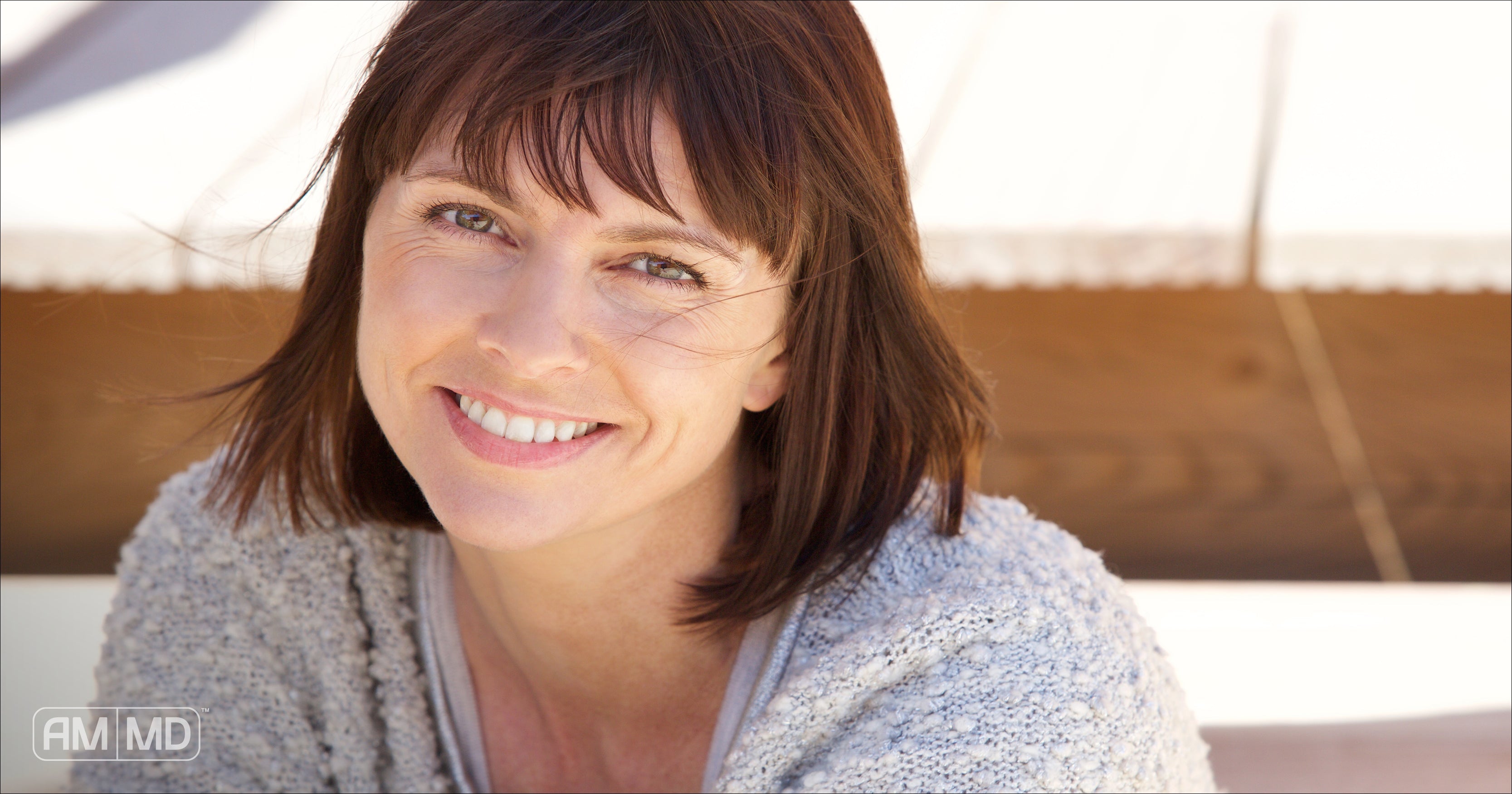 Woman smiling - The Top 6 Probiotic Benefits for Women - AMMD™