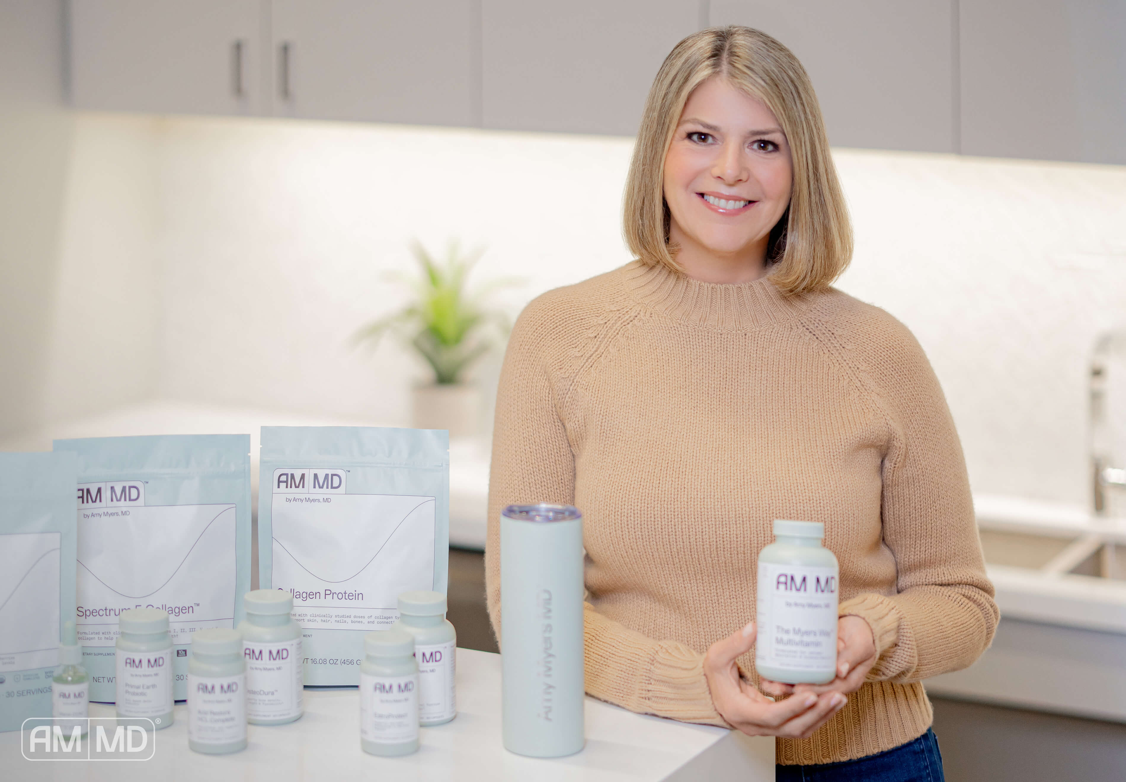 Dr. Myers standing next to AMMD Supplements