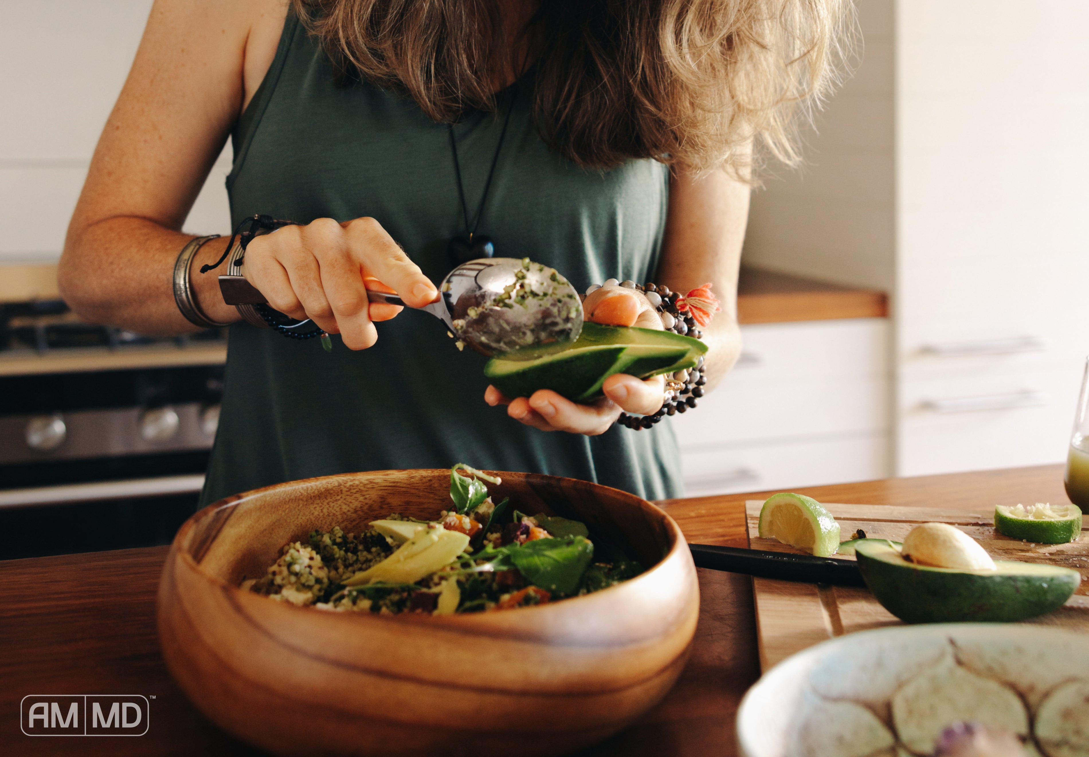 Woman preparing food - The Perimenopause Diet Guide to Nourish Your Body - AMMD™