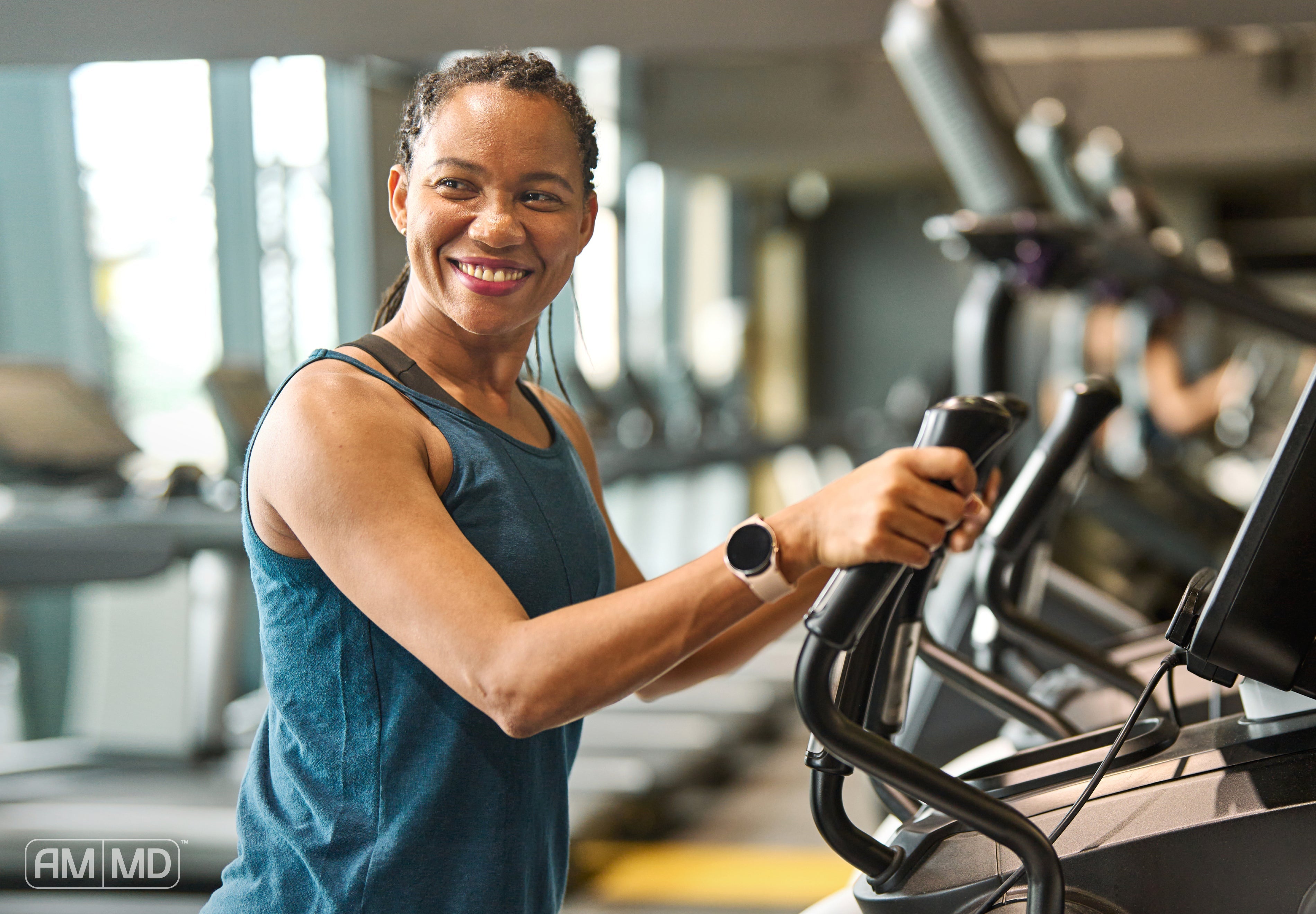 Woman exercising - The Role of Testosterone Levels in Perimenopause - AMMD™