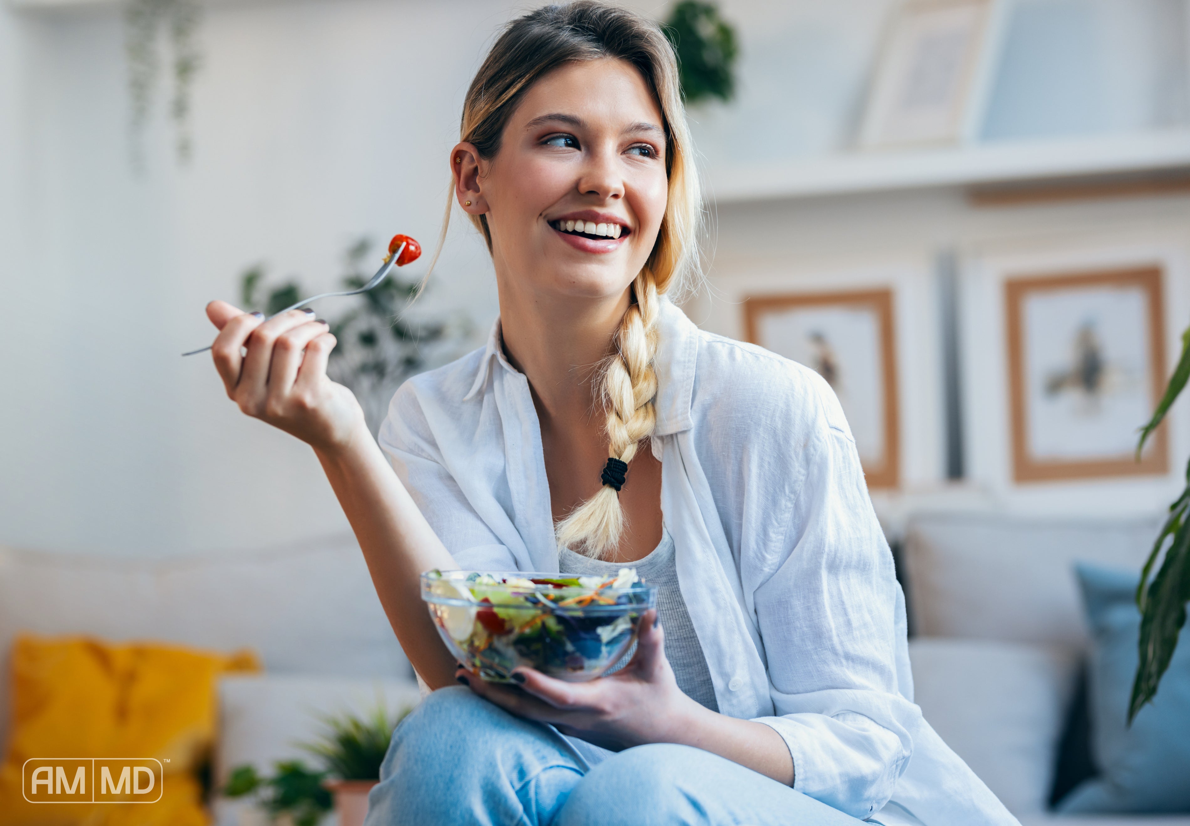Woman eating a salad - What Is The Functional Medicine Approach? A Beginner’s Guide - AMMD™