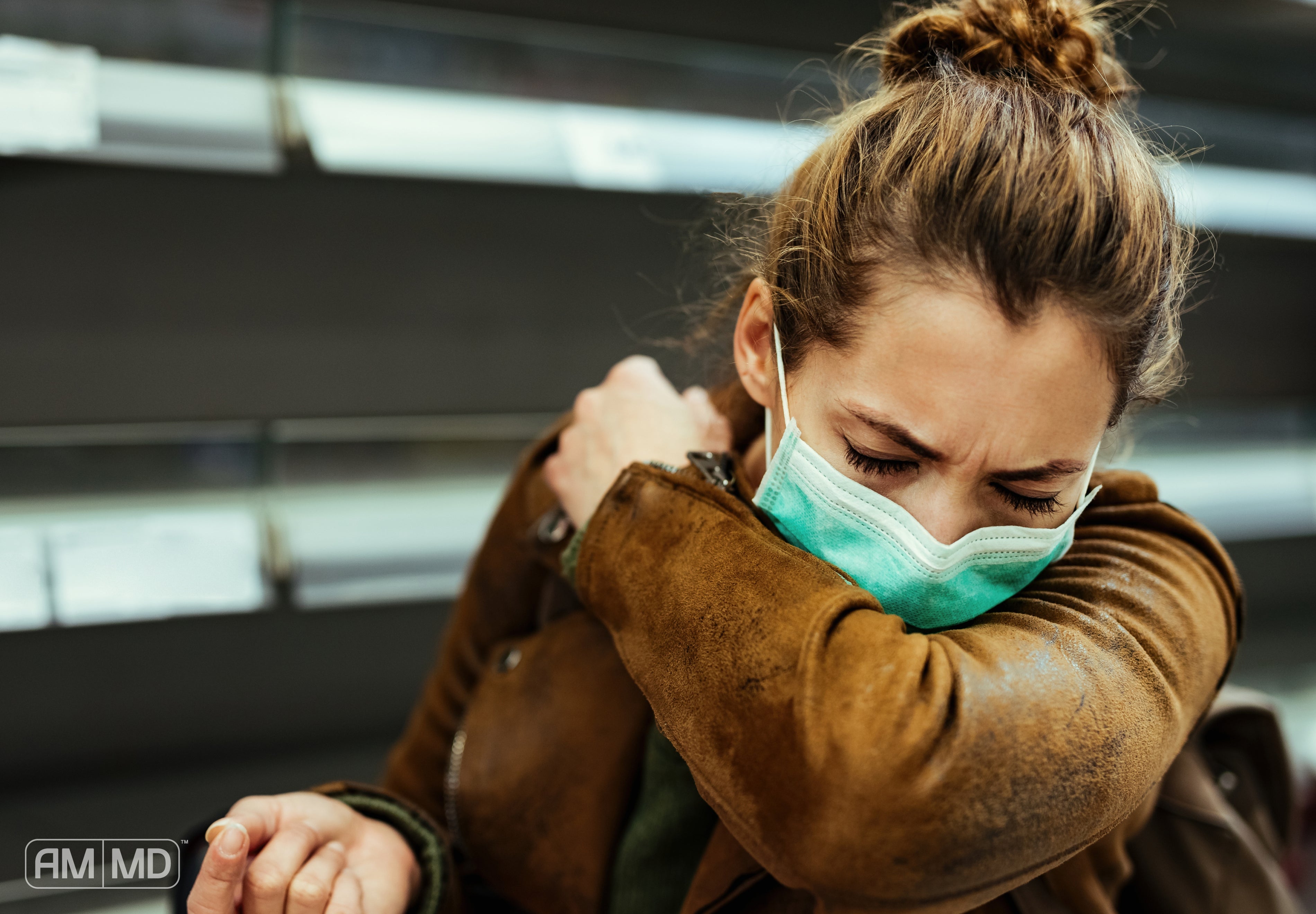 Girl coughing with mask on - Why Do I Get Sick So Often? Causes & Solutions - AMMD™