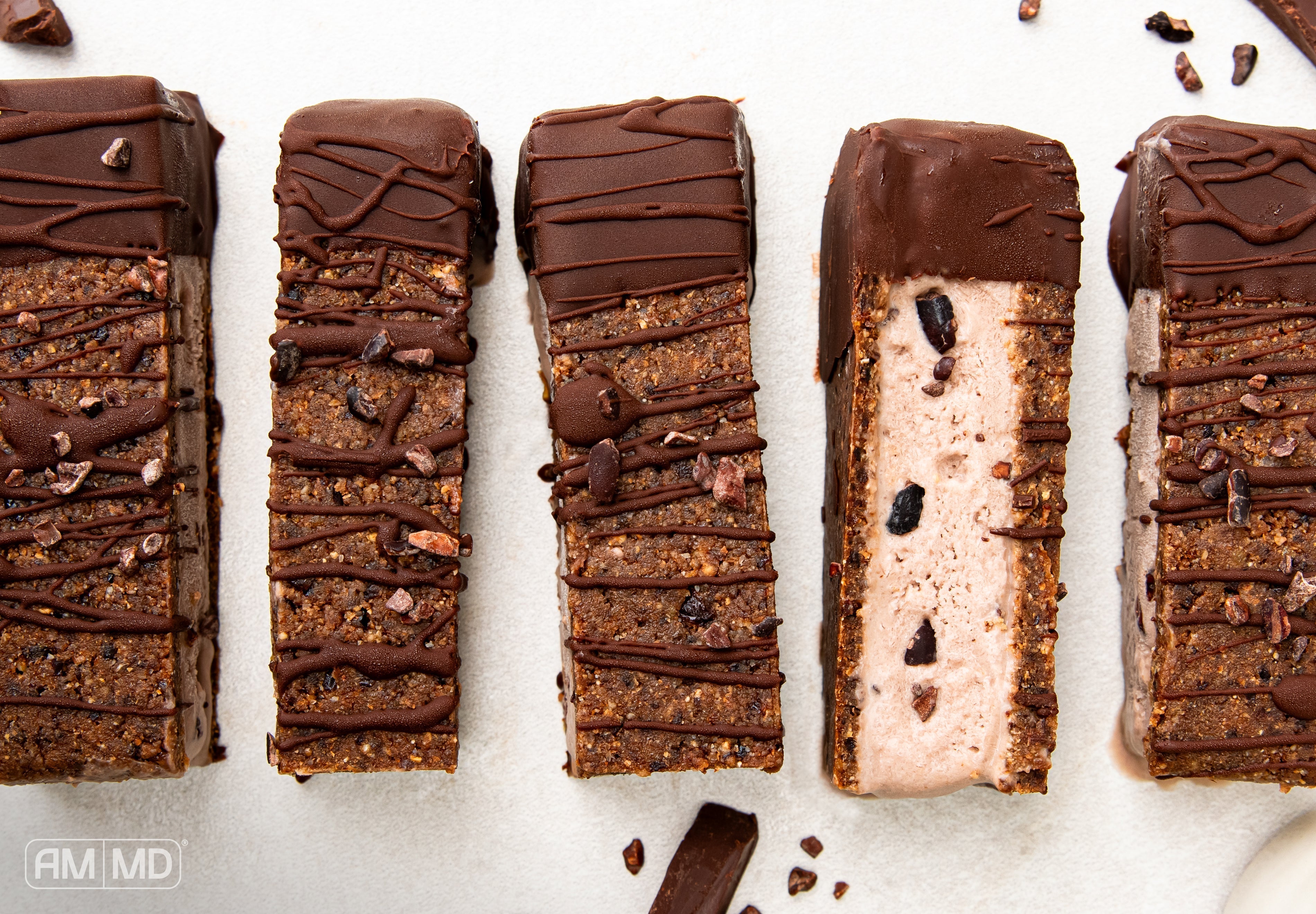 Chocolate-coated mocha latte protein ice cream bars made with a gluten-free cookie crust and creamy dairy-free filling