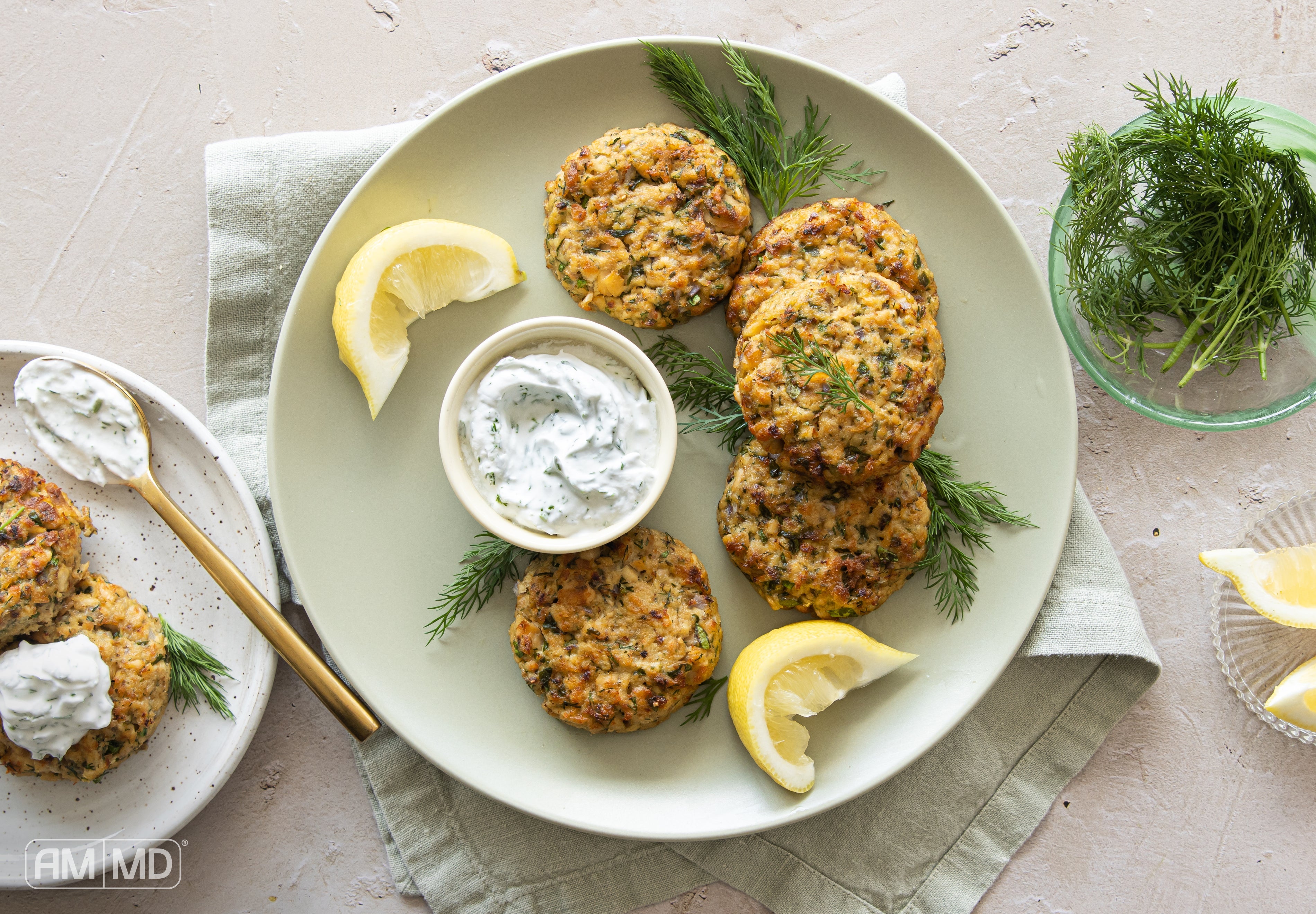 Paleo Salmon Cakes on a plate - AMMD™
